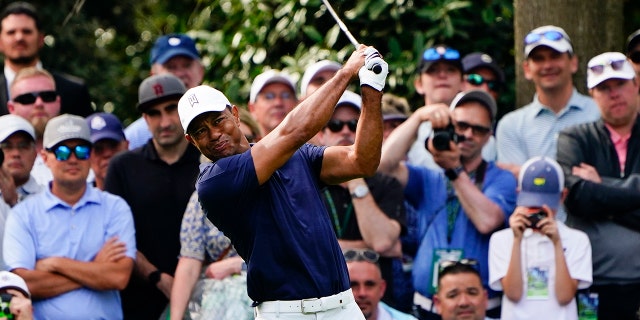 Tiger Woods tees off on the seventh hole during a practice round for The Masters golf tournament on Monday, April 4, 2022, in Augusta, Georgia.