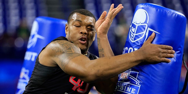 Travon Walker of Georgia runs a drill during the NFL Combine at Lucas Oil Stadium on March 5, 2022, in Indianapolis, Indiana.