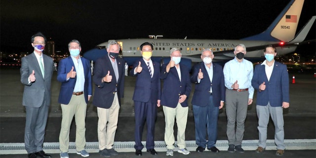 Sens. Lindsey Graham, Bob Menendez, Richard Burr, Rob Portman and Ben Sasse, and Rep. Ronny Jackson were greeted on their arrival to Taiwan, April 14, 2022.