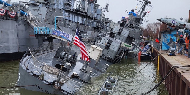 The USS The Sullivans, a decommissioned ship in Buffalo, New York, was partially submerged Thursday, April 14, 2022.