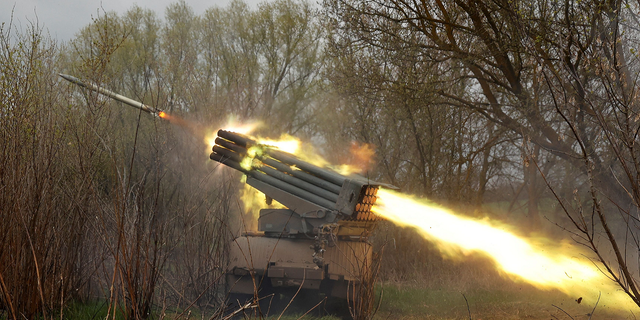 The Ukrainian military fire from a BM-21 Grad multiple launch rocket system on April 20, 2022 in the Kharkiv region.
