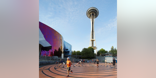 Play and training area next to Museum of Pop Culture. Space Needle, Seattle, United States. Architect: Olson Kundig, 2020. 