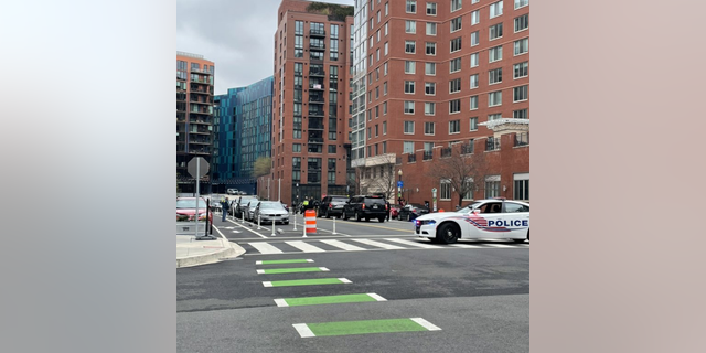 DC apartment that housed alleged fake feds hires national security firm for 'complete audit' 8 Federal law enforcement agencies enter an apartment building in Washington, D.C.