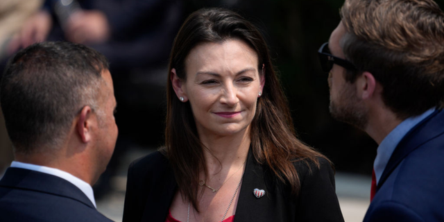 Nikki Fried, Florida Commissioner of Agriculture and a Democratic candidate for 2022 Florida gubernatorial race, arrives for a ceremony with U.S. President Joe Biden. 