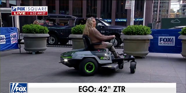 Alison Bedell, wife of home improvement expert Skip Bedell, takes EGO Power+ 42" ZTR lawn mower for a spin on Fox Square in midtown Manhattan on April 15, 2022. (Fox News)