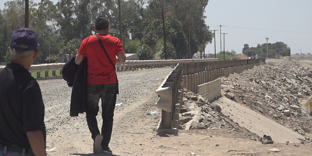 Migrants preparing to encounter Border Patrol agents after entering the U.S.