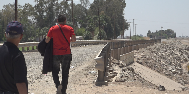 Migrants preparing to encounter Border Patrol agents after entering the U.S.