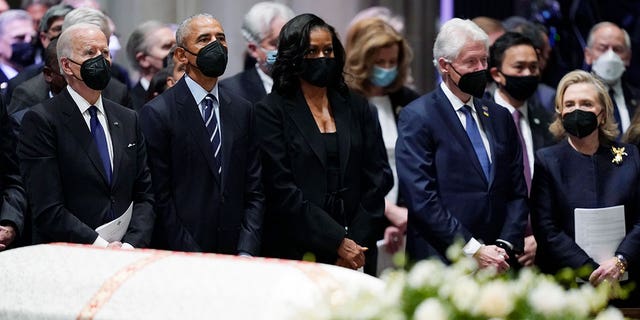 President Joe Biden, left, former President Barack Obama, former first lady Michelle Obama, former President Bill Clinton and former Secretary of State Hillary Clinton, during the funeral service for former Secretary of State Madeleine Albright at the Washington National Cathedral, Wednesday, April 27, 2022, in Washington. (AP Photo/Evan Vucci)