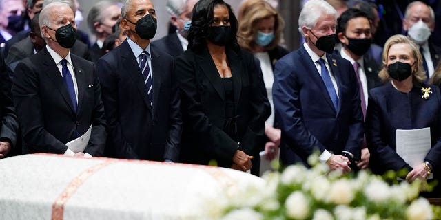 President Joe Biden, left, former President Barack Obama, former first lady Michelle Obama, former President Bill Clinton and former Secretary of State Hillary Clinton, during the funeral service for former Secretary of State Madeleine Albright at the Washington National Cathedral, Wednesday, April 27, 2022, in Washington. (AP Photo/Evan Vucci)