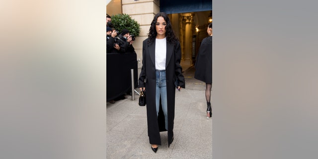 Amina Muaddi attends the Valentino Haute Couture Spring/Summer 2022 show as part of Paris Fashion Week on January 26, 2022 in Paris, France. On Friday, the shoe designer vehemently denied the rumored affair with A$AP Rocky.