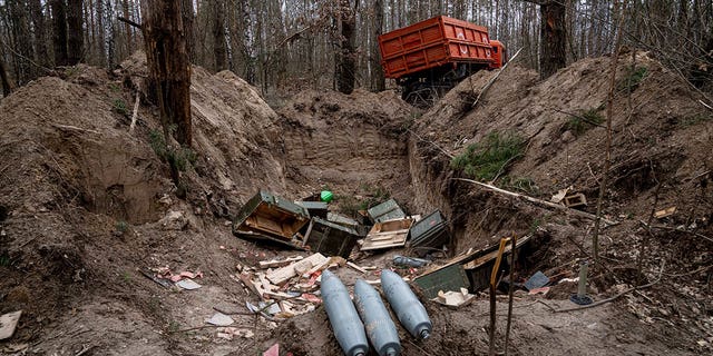 Ammunition lies near a school in Yahidne, near of Dnipro, Ukraine, Tuesday, April 12, 2022.