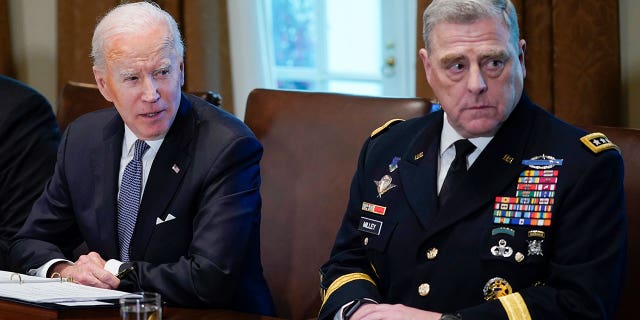 President Joe Biden and Chairman of the Joint Chiefs of Staff Gen. Mark Milley attend a meeting with military leaders in the Cabinet Room at the White House on April 20, 2022.