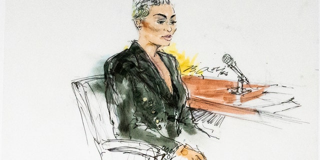 In this courtroom artist sketch, former reality television star Blac Chyna sits in court in Los Angeles, Tuesday, April 19, 2022. A jury has been seated in the trial that pits model and former reality television star Blac Chyna against the Kardashian family, who she alleges destroyed her TV career. 