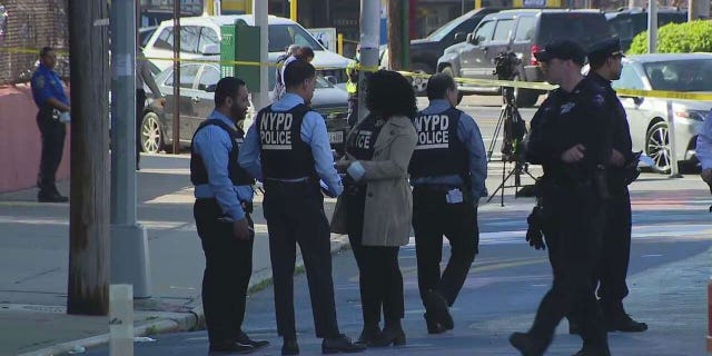 NYPD presence outside of P.S. 069 Journey Prep School in the Bronx, where a school safety agent was slashed in the neck Thursday morning.