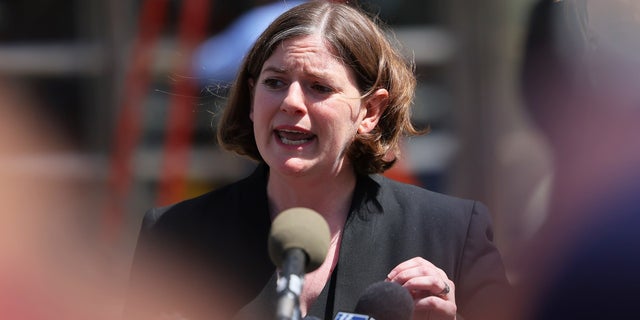 Mia Eisner-Grynberg, of Federal Defenders of New York and lawyer for mass shooting suspect Frank James, speaks with members of the media after a brief proceeding in Federal Court on April 14, 2022 in New York City. 