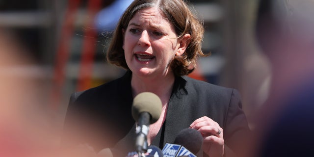 Mia Eisner-Grynberg, of Federal Defenders of New York and lawyer for mass shooting suspect Frank James, speaks with members of the media after a brief proceeding in Federal Court on April 14, 2022 in New York City.