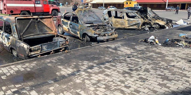Burnt out vehicles are seen after a rocket attack on the railway station in the eastern city of Kramatorsk, in the Donbass region on April 8, 2022. - More than 30 people were killed and over 100 injured in a rocket attack on a train station in Kramatorsk in eastern Ukraine, the head of the national railway company said.