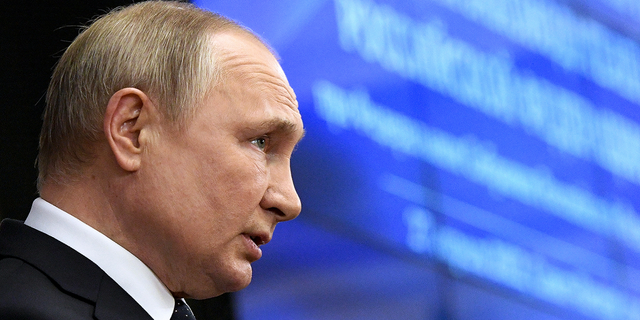 Russian President Vladimir Putin addresses a meeting of the Council of Legislators under the Russian Federal Assembly at the Tauride Palace, in St. Petersburg, Russia, on Wednesday, April 27.