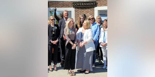 Chloe Bess, center left, saw Bowen Turner plead guilty to lesser charges in connection with her sex assault allegations last month.
