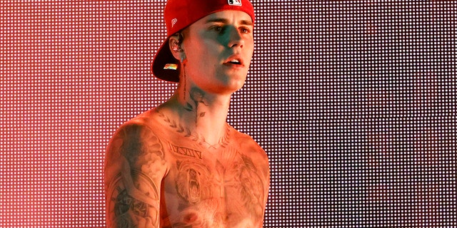 Justin Bieber went shirtless for his performance.