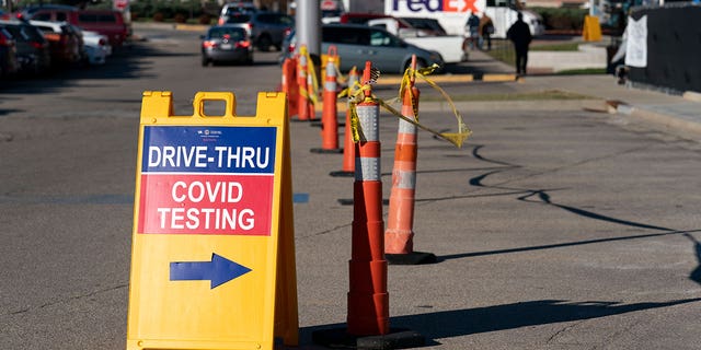 FILE - A sign points to a COVID testing site at the Cincinnati Veterans Affairs Medical Center in Cincinnati, on Jan. 3, 2022.                             (WHD Photo/Jeff Dean, File)