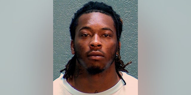 In this undated photo provided by the Arizona Department of Corrections, Rehabilitation and Reentry is Dandrae Martin. Sacramento police announced an arrest, Monday, April 4, 2022, connected to the shooting that killed and injured multiple people in the heart of California's capital as at least two shooters fired more than 100 rounds and people ran for their lives. Police said they booked Dandrae Martin, 26, as a "related suspect" on charges of assault with a deadly weapon and being a convict carrying a loaded gun.
