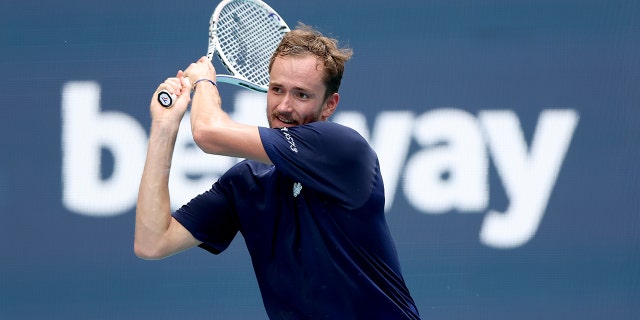 Daniil Medvedev of Russia returns a shot to Hubert Hurkacz of Poland during the Miami Open at Hard Rock Stadium on March 31, 2022 in Miami Gardens, Florida.