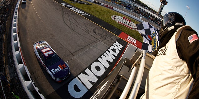 Denny Hamlin took the checkered flag to win the NASCAR Cup Series Toyota Owners 400 at Richmond Raceway.