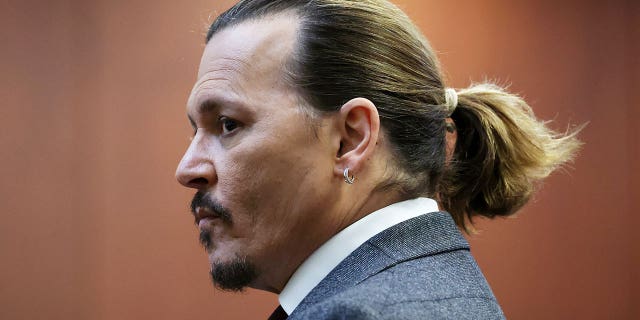 Actor Johnny Depp appears in the courtroom at the Fairfax County Circuit Court in Fairfax, Va., Thursday, April 28, 2022.