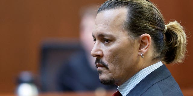 Actor Johnny Depp attends his defamation trial against his ex-wife Amber Heard, at the Fairfax County Circuit Courthouse in Fairfax, Virginia, U.S., April 27, 2022.