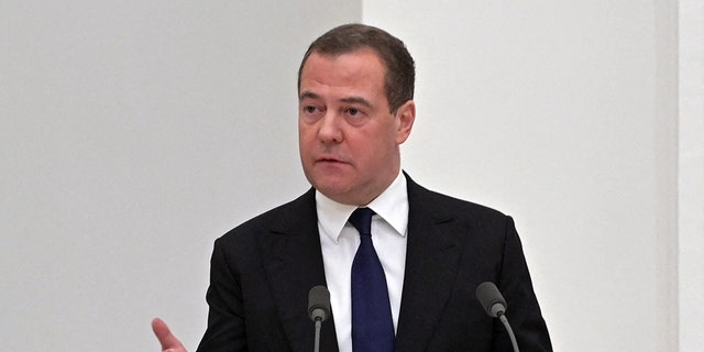 Deputy chairman of the Russian Security Council Dmitry Medvedev speaks during a meeting with members of the Security Council in Moscow on February 21, 2022.