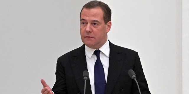 Deputy chairman of the Russian Security Council Dmitry Medvedev speaks during a meeting with members of the Security Council in Moscow on February 21, 2022.