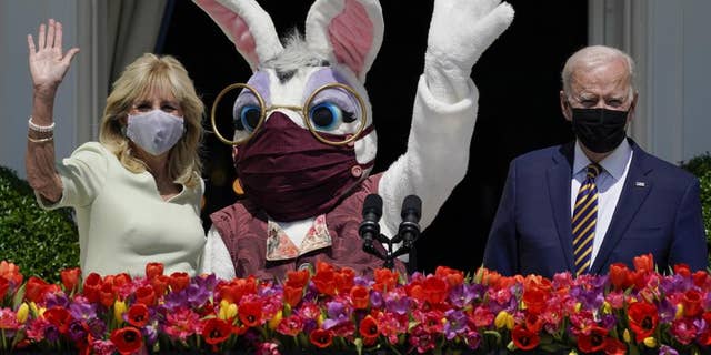 President Joe Biden appears with first lady Jill Biden and the Easter Bunny on the Blue Room balcony at the White House April 5, 2021, in Washington. The White House Easter Egg Roll is returning on April 18, 2022, after a 2-year, COVID-induced hiatus.