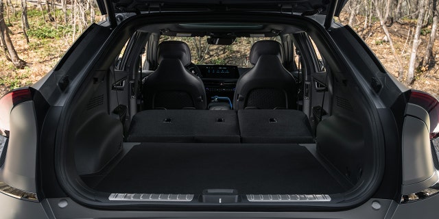 The EV6's cargo area is long, but short due to the roofline design.