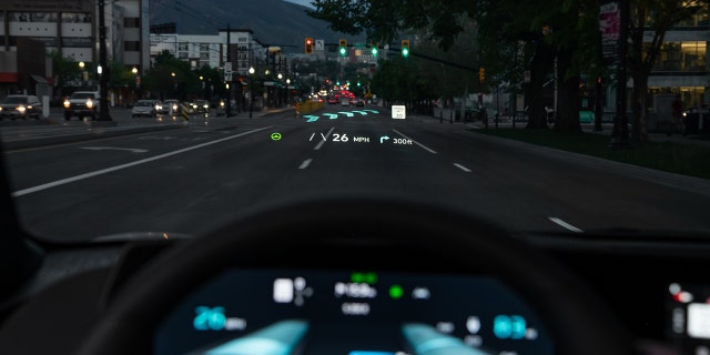 The EV6 head-up display features augmented reality graphics.