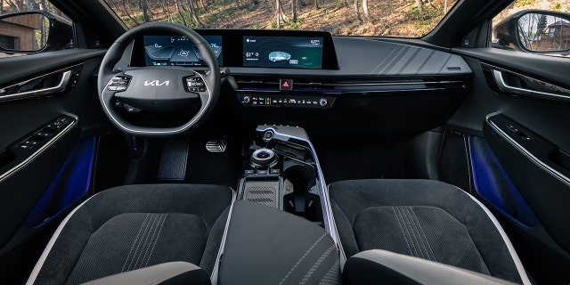 The EV6 is equipped with two digital screens and is lined with synthetic and recycled materials.