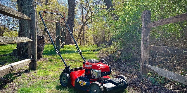 A Craftsman mower sits on a grassy path at Hoyt Farm Town Park in Commack, N.Y., on April 29, 2022. (Jeff Gumin)