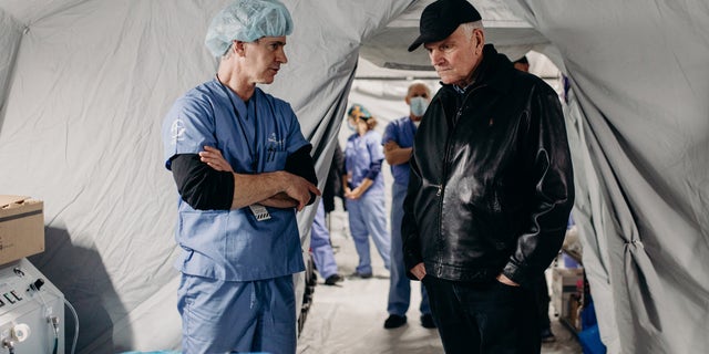 Franklin Graham (at right) is shown in April 2022 in one of the medical clinics his organization set up in Ukraine amid the Russia-Ukraine war. 