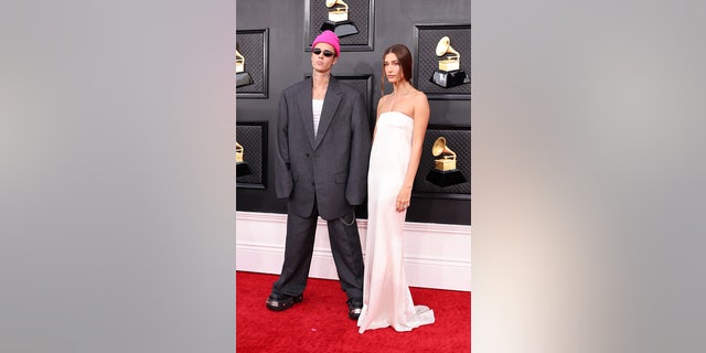 Justin Bieber and Hailey Bieber arrive at the 64th Annual Grammy Awards. Bieber is one of the most nominated artists at Sunday's award show.