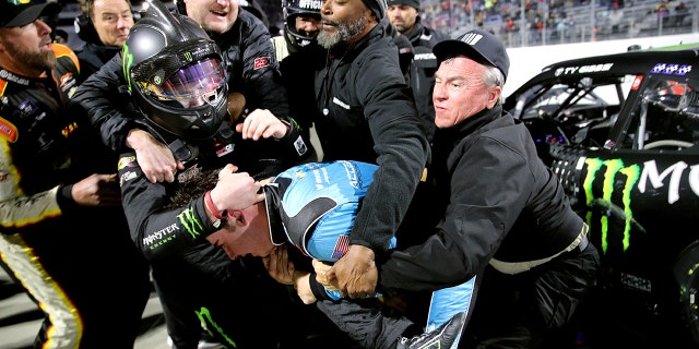 Crew members and officials had to break up the fight between Gibbs and Meyer.