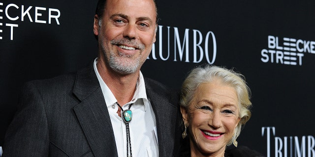 Rio Hackford and Helen Mirren attend the premiere of "Trumbo" at Samuel Goldwyn Theater on Oct. 27, 2015, in Beverly Hills, California.
