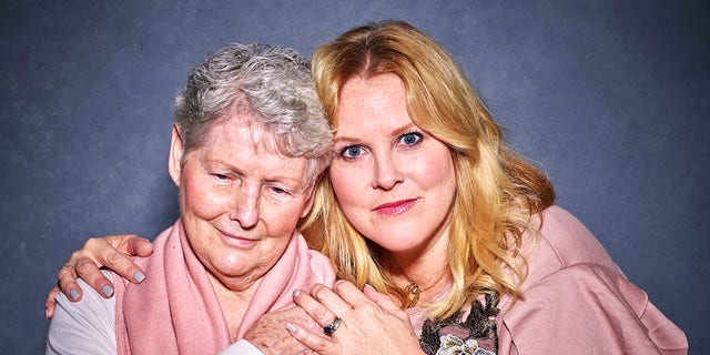 Julie Centrella and her mom, Anne, in one the portraits taken by photographer Joe Wallace, whose goal it is to help remove the stigma associated with Alzheimer's. 