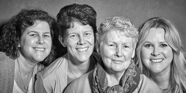 Anne Walsh (second from right) with three of her four children. Photographer Wallace's own grandfather suffered from Alzheimer's. "When I met Julie and her mother and her sisters," he said, "I was blown away by their strength and their ability to use the experience to draw them closer."