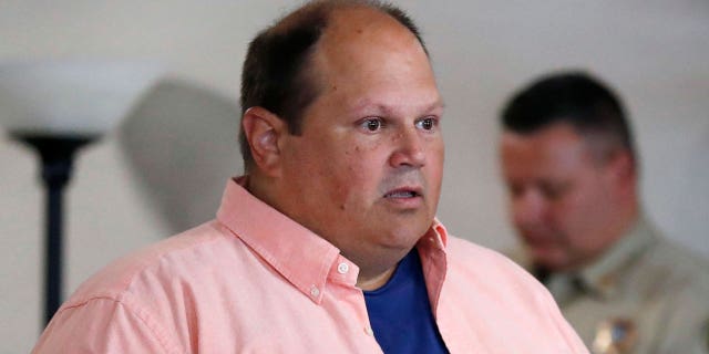 Former lottery computer programmer Eddie Tipton speaks during his sentencing hearing, Tuesday, Aug. 22, 2017, at the Polk County Courthouse in Des Moines, Iowa. Tipton, serving a 25-year prison sentence for rigging computers to win lottery jackpots has had his parole revoked after he got into trouble in prison just before his scheduled release. (AP Photo/Charlie Neibergall File)