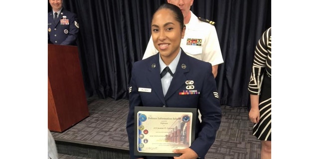 Former Air Force air traffic controller Jasmine Zielomski poses with her Defense Information School (DINFOS) diploma. (Jasmine Zielomski)