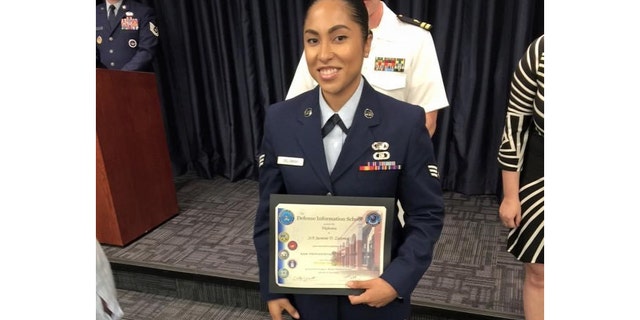 Former Air Force air traffic controller Jasmine Zielomski poses with her Defense Information School (DINFOS) diploma. (Jasmine Zielomski)