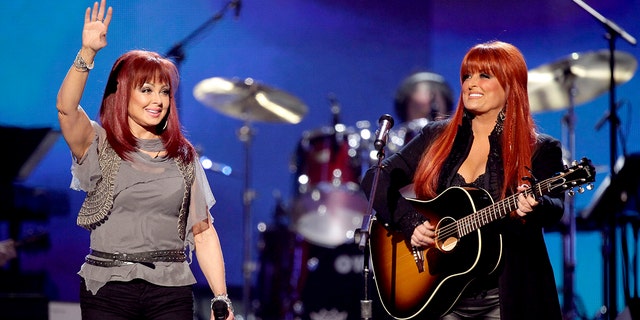   Naomi Judd, left, and Winona Judd, of The Judds, perform at Girls' Night Out: Superstar Women of Country in Las Vegas on April 4, 2011. 