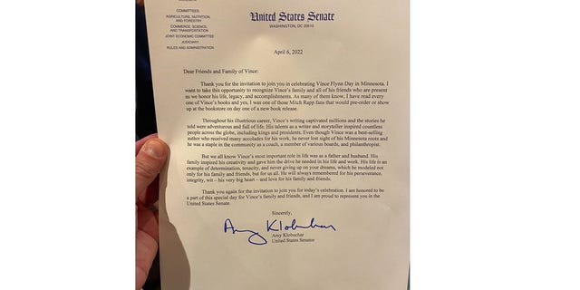 Vince Flynn Day, April 6, was created in Minnesota to recognize Vince Flynn for his accomplishments and his Minnesotan heritage. Shown is a copy of the letter that Minnesota Sen. Amy Klobuchar sent about Flynn. Her letter was read by an aide at the event on April 6. (@AtriaMysteryBus/Simon &amp; Schuster)