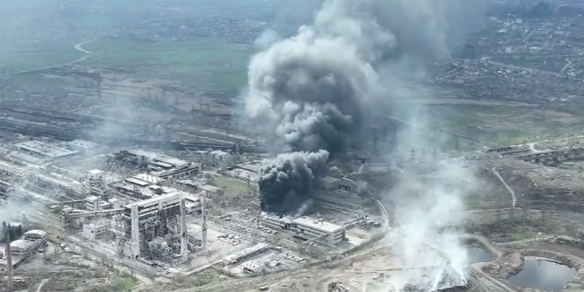 Smoke rises above Azovstal steelworks, in Mariupol, Ukraine, in this still image obtained from a recent drone video posted on social media.