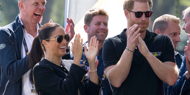 Prince Harry and Meghan Markle, Duke and Duchess of Sussex, attend the Land Rover Driving Challenge at the Invictus Games venue in The Hague, Netherlands, Saturday, April 16, 2022.
